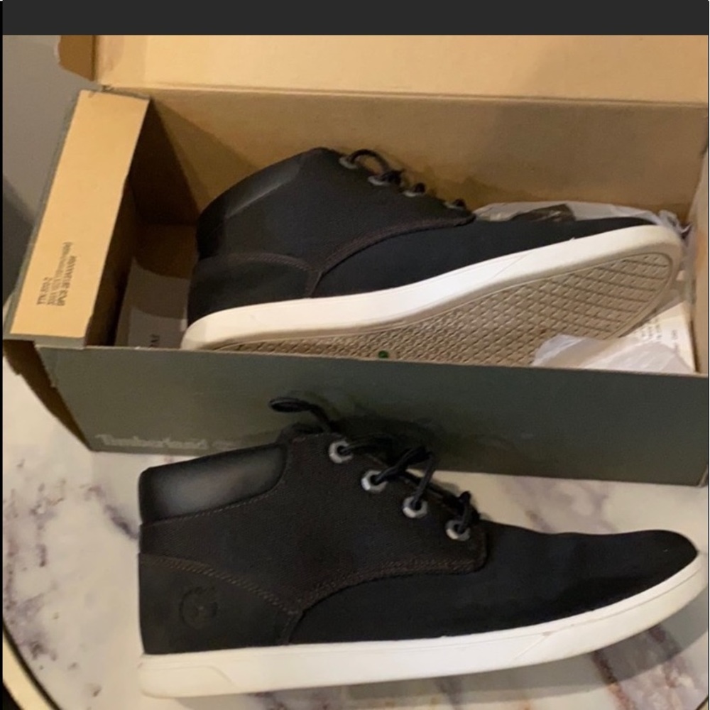 black Timberland high top sneakers